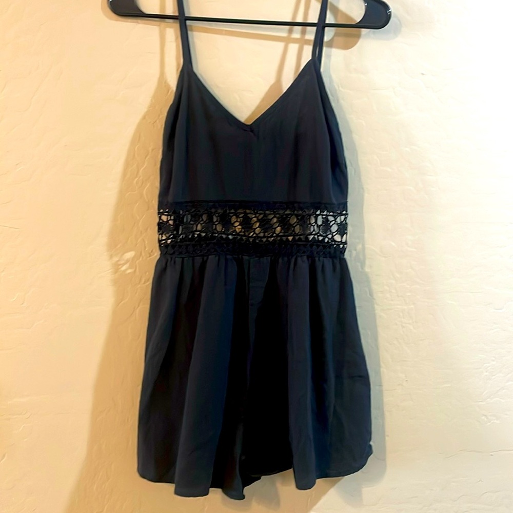 Black romper with floral cutout